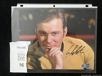 Full view of signed photo in sleeve