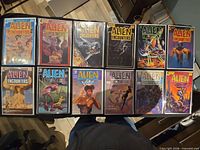 Twelve Alien Encounters issues displayed side by side