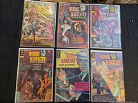 All six bagged issues laid out, showing front covers