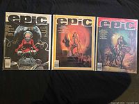 Front view of all three Epic Illustrated magazines in protective sleeves