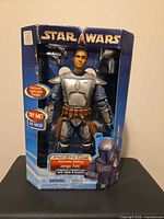 Front of box showing figure and Star Wars branding