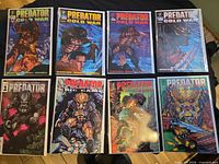 All eight Predator comics laid out