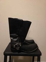Side view showing full boot profile and harness ring