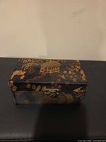Closed brocade storage box front view