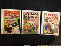 Front covers of the three bagged comics
