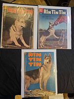 Front view of all three bagged Rin Tin Tin comics