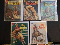 Front covers of all five comic books showing titles and artwork
