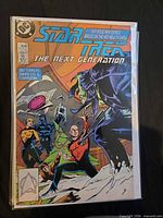 Issue #1 of six-issue mini-series in bag with board