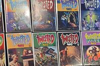 Front covers of multiple Twisted Tales issues arranged in two rows