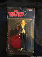 Front of sealed Riff Raff figure on card showing figure and bubble