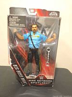 Front view of sealed Big Boss Man figure in package