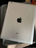 Rear view showing Apple logo and overall condition