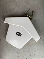 Front angled view of Jack HDTV antenna showing housing and brand logo
