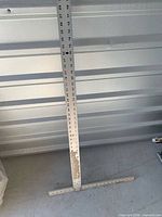 Full view of Johnson drywall T-square standing upright