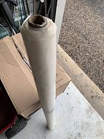 Full view of remaining roll on garage floor
