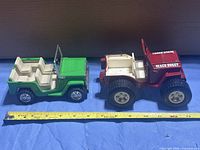 Top view showing both Jeeps side by side with tape measure for scale
