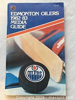 Front cover of media guide with Oilers puck image and price