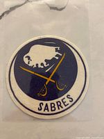 Front view of Buffalo Sabres felt crest patch