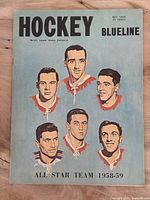 Front cover showing title, date, price and illustrated portraits