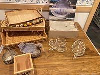 Overall lot showing baskets, Arcopal box with fish plates, leaf dishes and other containers
