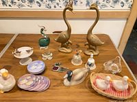 Group shot of all bird and duck items on table
