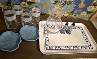 Entire lot showing tray, glasses, carafe, shakers, shell dishes