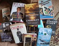 Group of hardcover and trade paperbacks showing several titles