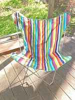 Front view showing multicoloured striped canvas and frame