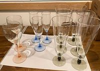 Full group of colored-stem stemware showing all eleven pieces