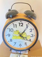 Front of Garfield twin-bell alarm clock showing dial and graphics