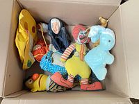 Box of assorted vintage toys