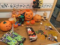 Wide view of assorted Halloween items on table