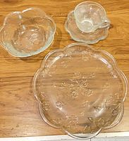 close-up of Savannah dinner plate, bowl, cup and saucer showing floral pattern