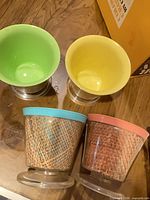 Four insulated dessert cups showing colours and cane wrap