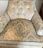 Front view showing overall chair design and upholstery pattern