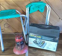 Stove case, two camp stools, red lantern