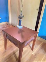 Table and lamp together showing relative size and style