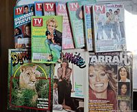 Top view of assorted TV Guide, Dynamite and Farrah issues