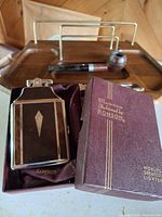 Ronson Mastercase lighter-cigarette case in box, pipe and dresser tray visible