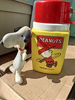 Thermos with Snoopy figure front view
