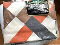 Sealed Springmaid Wondercal twin flat sheet brown/orange/white/black diamond print