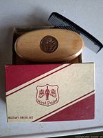 Box marked West Point Military Brush Set with brush and comb displayed