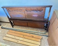 Headboard, footboard, metal rails, five slats overview