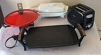 Front view of all four appliances together
