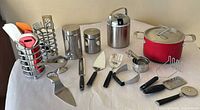 All cookware, utensils, canisters and holders arranged together