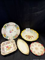 Group shot of all five porcelain pieces