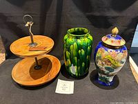 All three items side by side: 2-tier tray, green vase, multicolour urn with lid