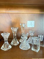 All seven crystal candle holders displayed together