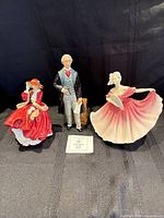 All three Royal Doulton figurines grouped together