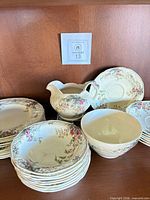 All stacked pieces with creamer and bowl visible